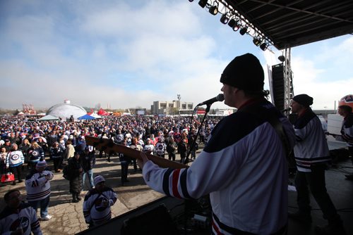 
RUTH BONNEVILLE / WINNIPEG FREE PRESS

 2016 Tim Hortons NHL Heritage Classic Alumni Game at Investors Group Stadium.
Almost Famous band plays to a sea of white and orange in the fun zone next to the stadium prior to the Alumni game Saturay.  

October 22, 2016