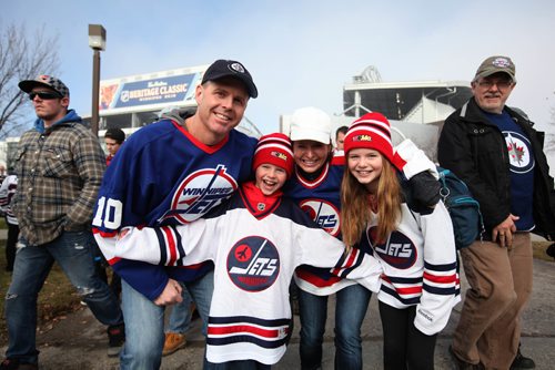 
RUTH BONNEVILLE / WINNIPEG FREE PRESS

The MacInness family, Dad-Doug, mom-Shannon, son Ben (9yrs) and daughter Abby (11yrs), show off their excitement outside the stadium prior to the start of the alumni game Saturday.  2016 Tim Hortons NHL Heritage Classic Alumni Game at Investors Group Stadium.


October 22, 2016