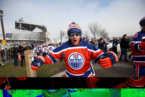 
RUTH BONNEVILLE / WINNIPEG FREE PRESS

Terry Olson from Edmonton hams it up for the camera showing off his excitement  as he attends game with 8 of his friends from Edmonton Saturday.   2016 Tim Hortons NHL Heritage Classic Alumni Game at Investors Group Stadium.


October 22, 2016