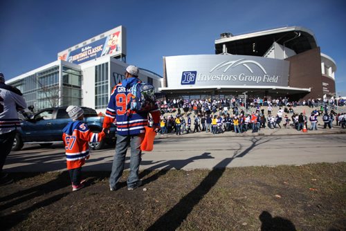 
RUTH BONNEVILLE / WINNIPEG FREE PRESS

Fans young and old in orange and white make their way to entrance to stadium before gates open Saturday.   2016 Tim Hortons NHL Heritage Classic Alumni Game at Investors Group Stadium.


October 22, 2016