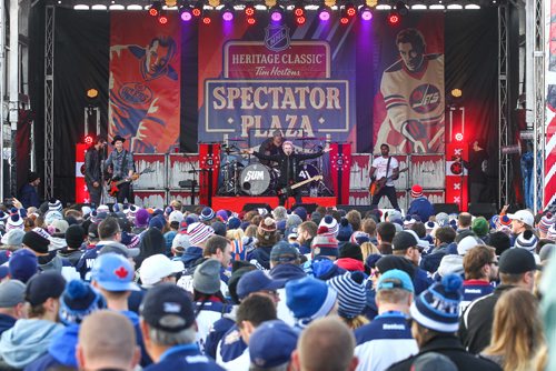 MIKE DEAL / WINNIPEG FREE PRESS
Punk rock band Sum 41 performs for hundreds of fans at the Spectator Plaza stage across the street from IGF field Sunday.
161023 - Sunday October 23, 2016