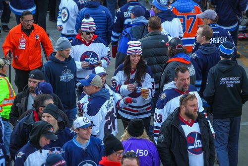 MIKE DEAL / WINNIPEG FREE PRESS
Fans make their way around the concourse prior to start of the NHL game between the Winnipeg Jets and the Edmonton Oilers at Investors Group Field.
161023 - Sunday October 23, 2016