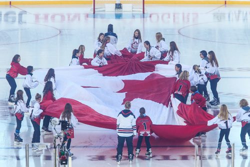 MIKE DEAL / WINNIPEG FREE PRESS
A huge Canadian flag is brought out prior to start of the NHL game between the Winnipeg Jets and the Edmonton Oilers at Investors Group Field.
161023 - Sunday October 23, 2016