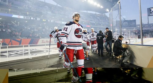 MIKE DEAL / WINNIPEG FREE PRESS
The Winnipeg Jets' Alexander Burmistrov (91) leaves the ice after the game against the Edmonton Oilers at Investors Group Field.
161023 - Sunday October 23, 2016