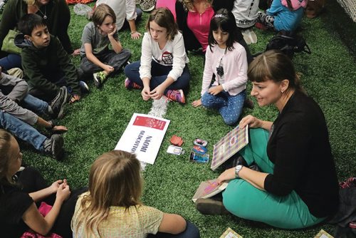 Canstar Community News Students from several Winnipeg schools talk to Naomi Oldcotton, a human book, at the Everybody has the Right program at the Soccer North complex on Oct. 18, 2016.