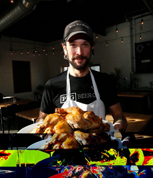 WAYNE GLOWACKI / WINNIPEG FREE PRESS


Restaurant Review of  the PEG Beer Co. on Pacific Ave.  Chef Aron Epp with Whole Roasted Chicken platter.. Alison Gillmor story Oct. 25 2016