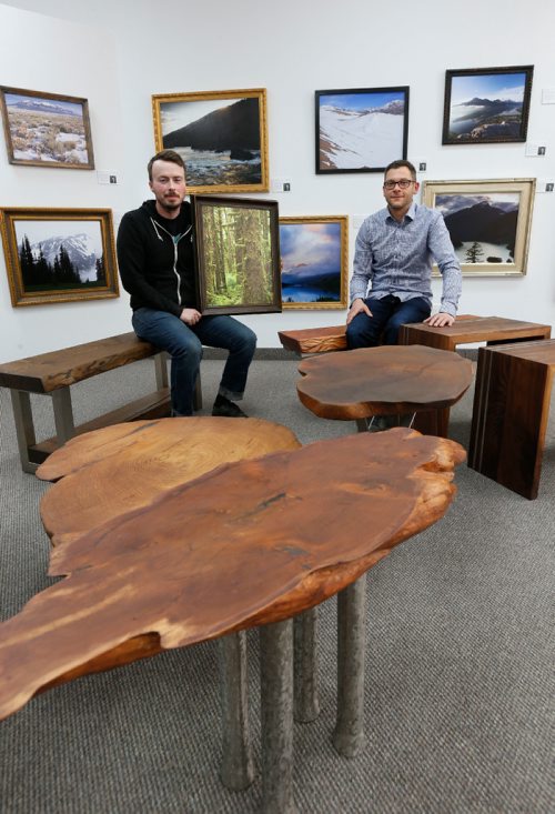 WAYNE GLOWACKI / WINNIPEG FREE PRESS



At right, Ryan Henderson owner of Living Edge Handcrafted Furnishings surrounded by his furniture with and Robert Lowdon owner of Robert Lowdon Gallery with his photographs. CentreVenture-assisted this pop-up retail location on Graham Avenue. Murray McNeill story Oct. 25 2016