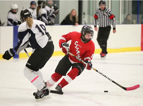 PHIL HOSSACK / WINNIPEG FREE PRESS -  Kelvin Klipper #8 Coco Diamond-Burchuk wheels around West Kildonan Wolverine Taylor McCaskill Tuesday afternoon at the Seven Oaks Sports Complex. See story?   October 24, 2016