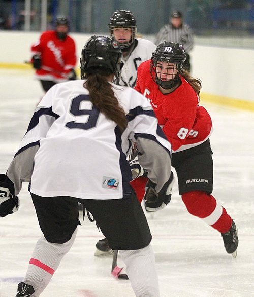 PHIL HOSSACK / WINNIPEG FREE PRESS -  Kelvin Klipper #8 Coco Diamond-Burchuk wheels through traffic towards West Kildonan Wolverine #9 Bianca McKay Tuesday afternoon at the Seven Oaks Sports Complex. See story?   October 24, 2016