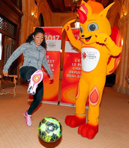 BORIS MINKEVICH / WINNIPEG FREE PRESS
2017 Canada Games event to announce new sponsors. At the event Winnipeg's Desiree Scott,, left, Olympic soccer team member, has some fun with a soccer ball while Canada Games mascot named Niibin. Photo taken after the end of the event in the Fort Garry Hotel in downtown Winnipeg. Ashley Prest story. Oct. 27, 2016