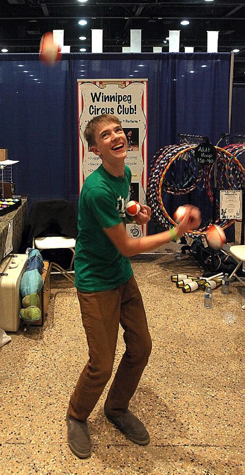 PHIL HOSSACK / WINNIPEG FREE PRESS - Jonny Teakle works on his juggling while minding the Winnipeg Circus Club display at the Convention Centre Friday. Comic Con brings out the best from across the universe at the Convention Centre this weekend. See Randall King's story.  October 28, 2016