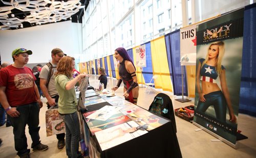 
RUTH BONNEVILLE / WINNIPEG FREE PRESS

Cosplayer Holli Wolf sells her pinup posters at Comic Con Saturday at the RBC Convention Centre.  
See Randall King story.  



October 29, 2016