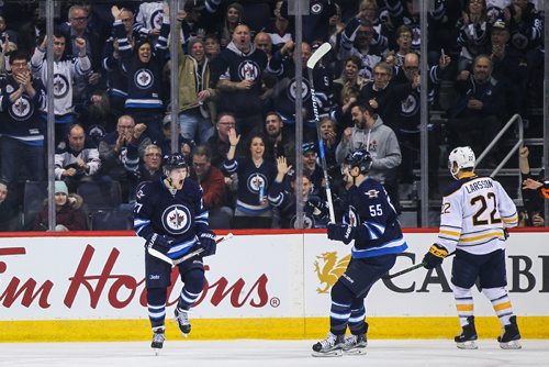 MIKE DEAL / WINNIPEG FREE PRESS
The Winnipeg Jets' Nikolaj Ehlers (27) celebrates his goal against the Buffalo Sabres during NHL game action Sunday afternoon at the MTS Centre.
161030 - Sunday October 30, 2016