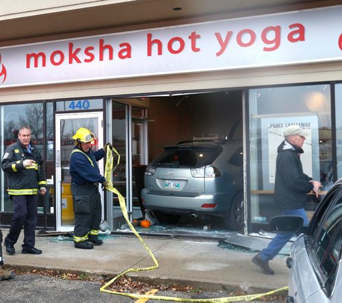 WAYNE GLOWACKI / WINNIPEG FREE PRESS


Winnipeg Fire Fighters at  the Moksha Hot Yoga studio in the Kildonan Crossing mall on Regent Ave. Monday morning after a vehicle crashed through front window. No one one was injured in the studio and the driver was transported to the hospital to be checked out.  Oct. 31 2016
