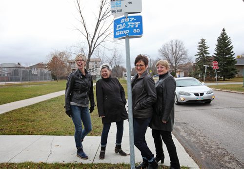 RUTH BONNEVILLE / WINNIPEG FREE PRESS

 Intersection slice-of-life piece about Joanne Dunsmore and her three "bus buddies." The four women weren't friends 15 years ago but got to know each other by catching the same bus together, morning after morning. After starting light conversations on their ways to work, they started going out together on weekends to movies, dinners etc. and even though 3 of the 4 are now retired and no longer catch the bus, they still get together regularly... Who says you can't make friends on the bus?
Names:  Joanne Dunsmore (short blond and dark funky hair with jeans on), Joelle Rochon (short blond black jeans), Sandra Burling (very tall, glasses, blond) and Kerri McKay (dark auburn hair).  
Left to right -  Sandra Burling, Joanne Dunsmore, Kerri McKay and  Joelle Rochon.  
See Dave Sanderson Story. 
October 29, 2016