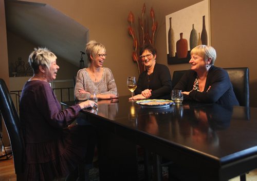 RUTH BONNEVILLE / WINNIPEG FREE PRESS

 Intersection slice-of-life piece about Joanne Dunsmore and her three "bus buddies." The four women weren't friends 15 years ago but got to know each other by catching the same bus together, morning after morning. After starting light conversations on their ways to work, they started going out together on weekends to movies, dinners etc. and even though 3 of the 4 are now retired and no longer catch the bus, they still get together regularly... Who says you can't make friends on the bus?
Names:  Joanne Dunsmore (short blond and dark funky hair with jeans on), Joelle Rochon (short blond black jeans), Sandra Burling (very tall, glasses, blond) and Kerri McKay (dark auburn hair).  
Left to right -  Joanne Dunsmore, Sandra Burling, Kerri McKay and Joelle Rochon.  

See Dave Sanderson Story. 
October 29, 2016
