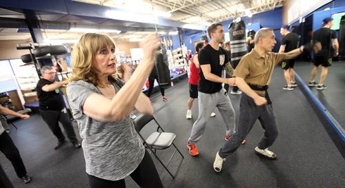 PHIL HOSSACK / WINNIPEG FREE PRESS -  Francine Lee throws punches  during a workout for "Counter Punch" a boxing program for Parkinson's patients.  See Jeff Hamilton's story.  November 1, 2016
