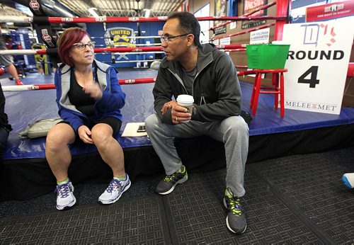 PHIL HOSSACK / WINNIPEG FREE PRESS -  Sheri Larsen-Celhar and Tim Hague chat before a session at the United Gym for "Counter Punch" a boxing program for Parkinson's patients. Sheri's son Brandt Butt runs the program. See Jeff Hamilton's story.  November 1, 2016