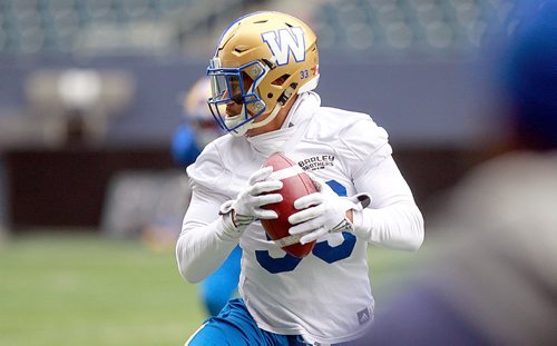 PHIL HOSSACK / WINNIPEG FREE PRESS -  Hometown running back Andrew Harris runs the ball at the morning workout, he returned to Winnipeg in free agency and has earned the clubs Most Outstanding Canadian nomination.   See Jeff Hamilton's story. November 2, 2016