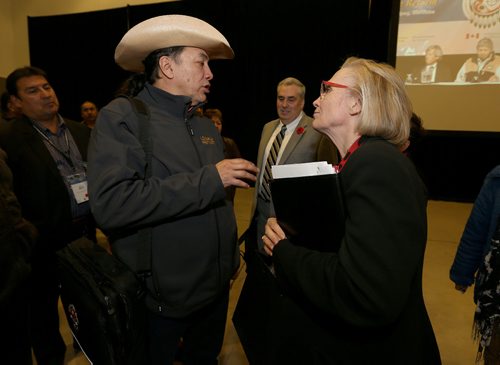 JASON HALSTEAD / WINNIPEG FREE PRESS

Carolyn Bennett, federal Minister of Indigenous and Northern Affairs, speaks with Long Plain First Nation Chief Dennis Meeches at the Assembly of First Nations National Housing and Infrastructure Forum at the RBC Convention Centre Winnipeg on Nov. 2, 2016. (See Carol Sanders story)
