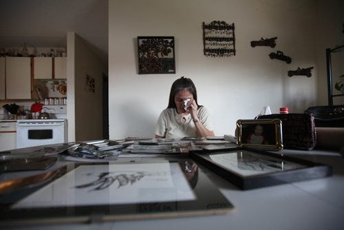 RUTH BONNEVILLE / WINNIPEG FREE PRESS


Photos of Debra Sinclair in her home as she gets very emotional going through stacks of photos of her son Waylone Smith from a infant till he went missing at age 18, 10 years ago.  
 
What: In 2006, Debra Sinclairs eldest son, Waylon, went for a walk by his grandparents home in Lake St. Martin. He never returned. In the 10 years since, all Debra has had to keep her going is rumours, which become progressively more violent with every passing year. Still, she believes that somebody knows what happened to him. And on Thursday, she is planning to walk from what is left of Lake St. Martin  which was destroyed by flooding  to Winnipeg. She hopes to reach the city on Sunday, which would be Waylons 28th birthday.
 
See Melissa Martin's Saturday 49.8 column.

Nov 02, 2016