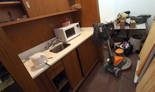 PHIL HOSSACK / WINNIPEG FREE PRESS -  The City Hall "media room", trash accumulated in corners, including an floor polisher sitting in an un used kitchen area...... The area is going to be turned into a modern media cpnference room. See Aldo's story. November 4, 2016
