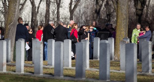 MIKE DEAL / WINNIPEG FREE PRESS
People walk amongst the graves of fallen soldiers in the Brookside Cemetery Field of Honour Sunday morning. The cemetery held a tour and remembrance service to honour the more than 11,000 war veterans interred there.
161106 - Sunday November 6, 2016