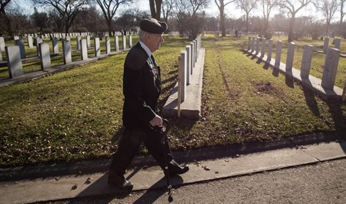 MIKE DEAL / WINNIPEG FREE PRESS
John Stoyka a WW2 war veteran who served with the Royal Winnipeg Rifles walks amongst the graves of fallen soldiers in the Brookside Cemetery Field of Honour Sunday. The cemetery held a tour and remembrance service to honour the more than 11,000 war veterans interred there.
161106 - Sunday November 6, 2016