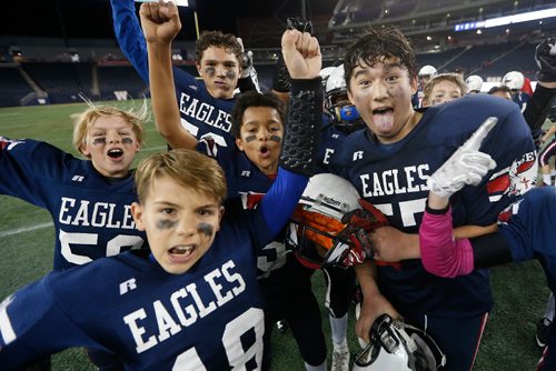 JOHN WOODS / WINNIPEG FREE PRESS
East Side Eagles celebrate a win over the St Vital Mustangs in the Football Manitoba Peewee Championship game Sunday, November 6, 2016. 
