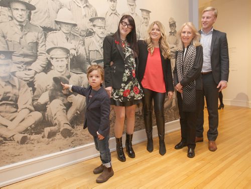 JOE BRYKSA / WINNIPEG FREE PRESS  L to R Cole Davidson, 4 yrs ( Great great grandson of Harry Coluburn) with Irene Grammel ( Curator) , Lindsay Mattick ( great grand daughter of of Harry Coluburn), Laureen Mattick ( Grand daughter of Harry Coluburn) and Rob Maycher( great grandson of Harry Coluburn) at the  opening of Remembering the Real Winnie, in the Pavilion galleries in Assiniboine Park.( Eds note solider in big background photo holding bear is not Harry Coluburn)   -Nov 07, 2016 -( See Bills story)