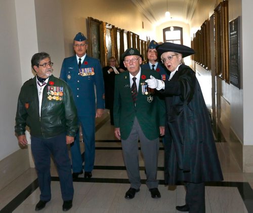 
WAYNE GLOWACKI / WINNIPEG FREE PRESS



At right, Myrna Driedger, Speaker, Legislative Assembly speaks to Armed Forces Veterans prior to their escort with the Speaker through the halls of the Manitoba Legislative building to the Chamber Monday. This week leading up to Remembrance Day, different members of the Armed Forces will be taking part, on  Tuesday , the Royal Canadian Air Force escort, on  Wednesday, the Canadian Army escort and on Thursday the Royal Canadian Navy will escort the Speaker. Nov. 7 2016
