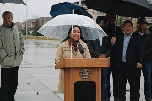 Canstar Community News Coun. Devi Sharma (Old Kildonan) speaks at the grand opening of Keewatin Street and Dr. Jose Rizal Way on Oct. 31, 2016.