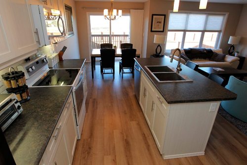 BORIS MINKEVICH / WINNIPEG FREE PRESS
RESALE HOMES - 6 Prairieview Cove in Dugald, Manitoba. The realtor is Anders Frederiksen. Open concept kitchen dining and living room. View from the end of the kitchen. Nov 7, 2016