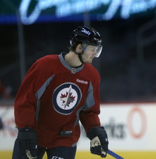 JOE BRYKSA / WINNIPEG FREE PRESSWinnipeg Jets Jacob Trouba  returns to the ice at MTS Centre after missing 13 games with a contract dispute. The Jets signed him to a 2 year $ 6 million dollar bridge deal .-Nov 08, 2016 -( See story)