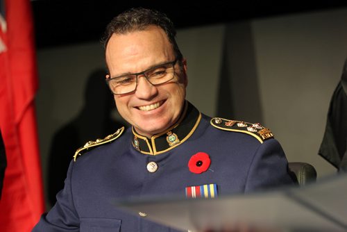 
RUTH BONNEVILLE / WINNIPEG FREE PRESS

Winnipeg new Police Chief Danny Smyth smiles as he prepares to sign the paperwork for the Oath of Office during ceremony  at the Met Tuesday.  
 

November 8,2016