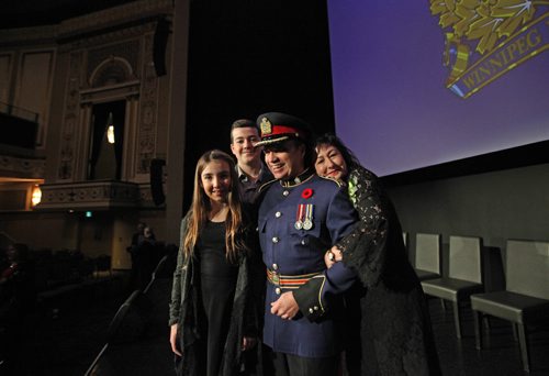 
RUTH BONNEVILLE / WINNIPEG FREE PRESS

Winnipeg new Police Chief Danny Smyth is all smiles as he poses with his family after Oath of Office Ceremony held at the Met Tuesday.  
Names: Danny with his wife Cynthia, son William and daughter Samantha.  
 

November 8,2016