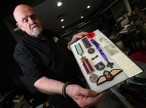 PHIL HOSSACK / WINNIPEG FREE PRESS - Marway Militaria, specializes in military memorabilia See Bill Redekop's tale. Proprietor Wayne Cline shos off some of his personal collection including his uncle G.A. Cline's medals. G.A. was killed in action flying in WW2.  November 8, 2016