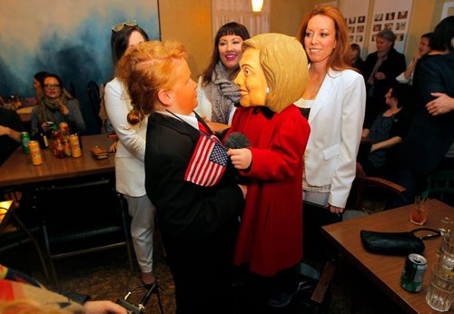 BORIS MINKEVICH / WINNIPEG FREE PRESS
The Tallest Poppy restaurant on Sherbrook election-themed Nasty Women/Bad Hombres party. Left, Zachary Penton, 10, dressed up as Donald Trump, and his little brother Oliver, 8, as Hillary Clinton. Behind them some other patrons dressed up as Nasty Women (middle Nasty Woman between them is Suzie Parker, left Nasty Women is Cheryl Stewart. Right Nasty woman behind Trump asked not to be identified because of a work conflict.) Nov 8, 2016
