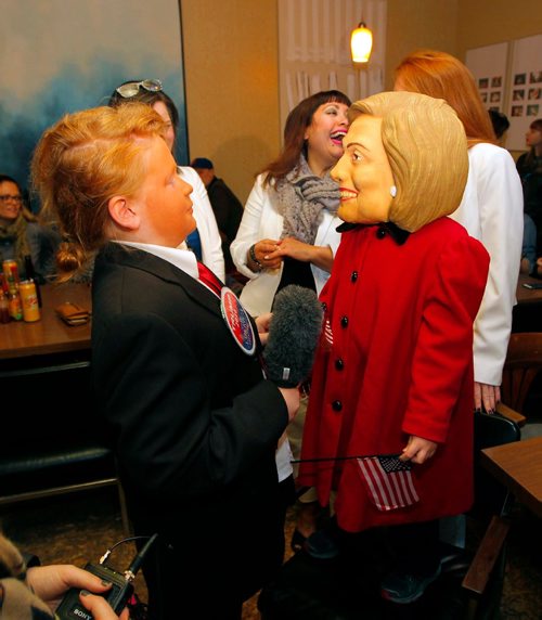 BORIS MINKEVICH / WINNIPEG FREE PRESS
The Tallest Poppy restaurant on Sherbrook election-themed Nasty Women/Bad Hombres party. Left, Zachary Penton, 10, dressed up as Donald Trump, and his little brother Oliver, 8, as Hillary Clinton. Behind them some other patrons dressed up as Nasty Women (middle Nasty Woman between them is Suzie Parker, left Nasty Women behind Clinton is Cheryl Stewart. Right Nasty woman behind Trump asked not to be identified because of a work conflict.) Nov 8, 2016