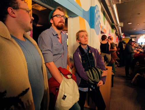 BORIS MINKEVICH / WINNIPEG FREE PRESS
The Good Will Social Club was packed with young people watching the US Election night. Left-right-  Mathew Baron, Nathan Sawatzky-Dyck, and Jami Reimer. Nov 8, 2016