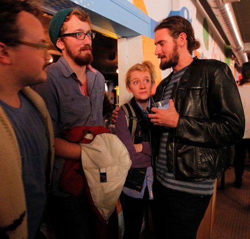 BORIS MINKEVICH / WINNIPEG FREE PRESS
The Good Will Social Club was packed with young people watching the US Election night. Left-right-  Mathew Baron, Nathan Sawatzky-Dyck, and Jami Reimer being comforted by Tyler Nielsen. Nov 8, 2016