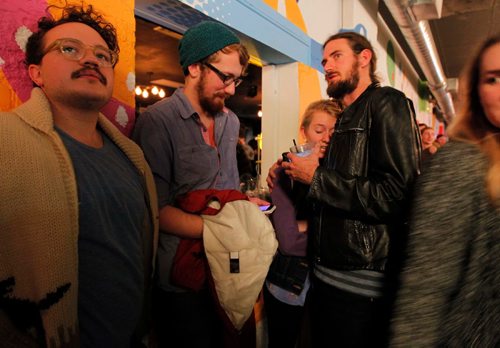 BORIS MINKEVICH / WINNIPEG FREE PRESS
The Good Will Social Club was packed with young people watching the US Election night. Left-right-  Mathew Baron, Nathan Sawatzky-Dyck, and Jami Reimer being comforted by Tyler Nielsen. Nov 8, 2016