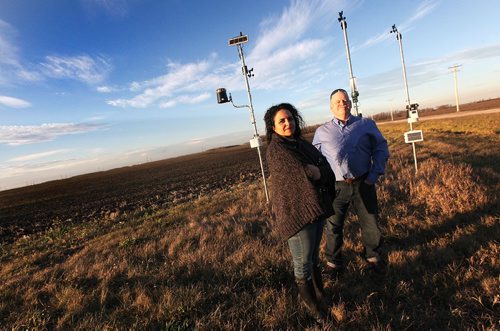 PHIL HOSSACK / WINNIPEG FREE PRESS -  Suzi Bonk and Guy Ash, founders of Winnipeg weather technology company, Precision Weather Solutions pose beside a field station near Winnipeg. They are partnering with John Deere. See Martin Cash story. November 9, 2016