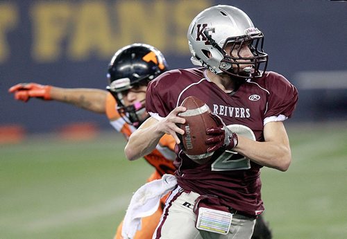 PHIL HOSSACK / WINNIPEG FREE PRESS - Kildonan East #2 Danny Harris scrambles to move the Ball against a St John's defence Wednesday evening at the Inverstor's Field in playoff action. See Mike Sawatzky's story. November 9, 2016