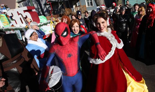 RUTH BONNEVILLE / WINNIPEG FREE PRESS

Members of Costume Alliance pose for the camera as they wait by the Salvation Army Toy Drive Float in the warm sunshine for the start of the Santa Claus Parade Saturday.  
Standup pic
November 12, 2016