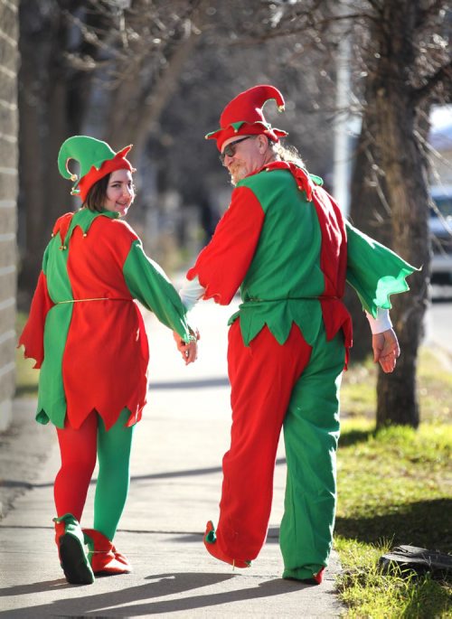 
RUTH BONNEVILLE / WINNIPEG FREE PRESS

Santa's elves - Anneka Neufeld  and Pat Peters  head to the Sunscape float before the Santa Claus Parade starts Saturday.  
Standup pic
November 12, 2016
