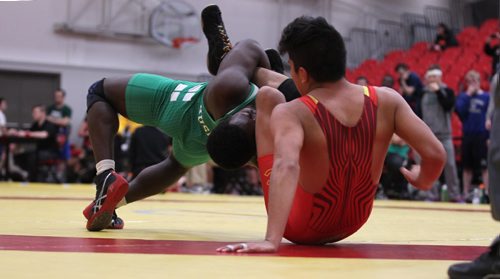 
RUTH BONNEVILLE / WINNIPEG FREE PRESS

Charles Cook  University of Calgary (red) and Ayobami Peluola  University of Sask (in green) take part in the Wesman Open Wrestling match at Duckworth Centre Saturday.
Standup photo 


November 12, 2016