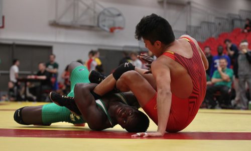 
RUTH BONNEVILLE / WINNIPEG FREE PRESS

Charles Cook  - University of Calgary (red) and Ayobami Peluola  - University of Sask (in green) take part in the Wesman Open Wrestling match at Duckworth Centre Saturday.
Standup photo 


November 12, 2016