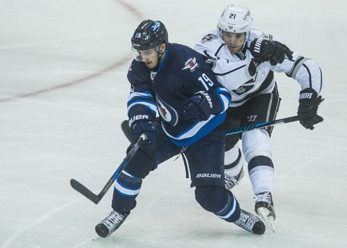 MIKE DEAL / WINNIPEG FREE PRESS
Winnipeg Jets' Nic Petan (19) and Los Angeles Kings' Nick Shore (21) during an afternoon NHL game at MTS Centre Sunday.
161113 - Sunday November 13, 2016