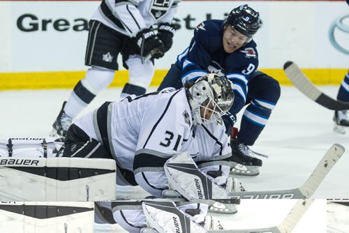 MIKE DEAL / WINNIPEG FREE PRESS
Winnipeg Jets' Andrew Copp (9) tries to get the rebound off of Los Angeles Kings' goaltender Peter Budaj (31) during an afternoon NHL game at MTS Centre Sunday.
161113 - Sunday November 13, 2016